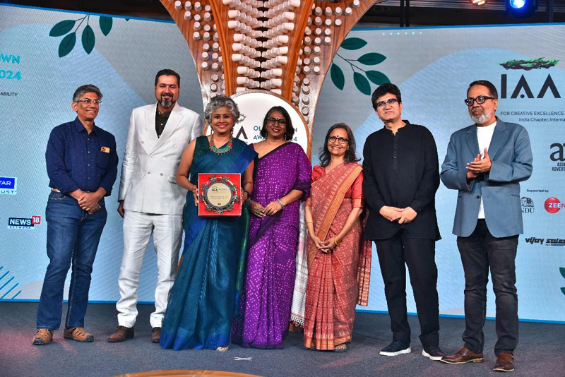 Team from Earth Brigade Foundation receiving the trophy